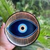Metzi Evil Eye